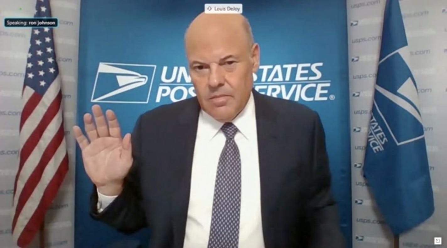 In this screenshot from U.S. Senate's livestream, U.S. Postal Service Postmaster General Louis DeJoy is sworn in for a virtual Senate Homeland Security and Governmental Affairs Committee hearing on U.S. Postal Service operations during Covid-19 pandemic August 21, 2020 in Washington, DC. The USPS is under financial and operational scrutiny ahead of the upcoming November presidential elections, where mail-in voting is set to play a large role given the Covid-19 pandemic.