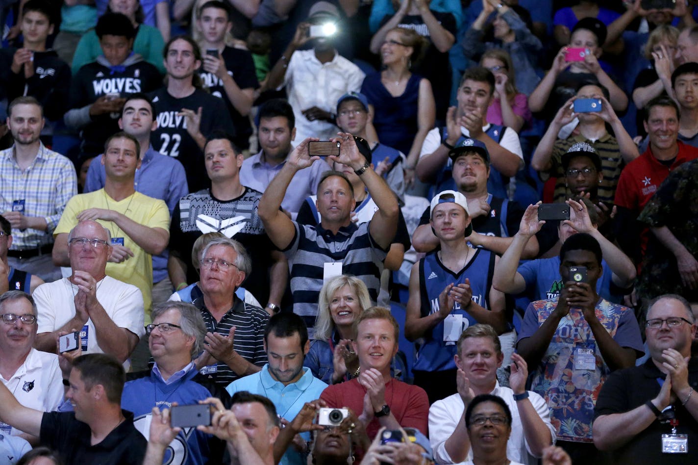 Minnesota Timberwolves fans cheered after the Timberwolves selected Karl-Anthony Towns with the first pick of the 2015 NBA draft. ] CARLOS GONZALEZ cgonzalez@startribune.com - June 25, 2015, Minneapolis, MN, Target Center, NBA Draft, Minnesota Timberwolves have the number one overall pick