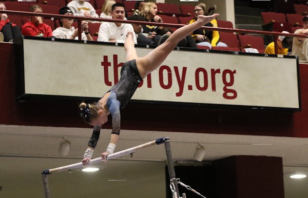 Emma Hennessey of Becker competed Friday during the Class 1A gymnastics state meet.