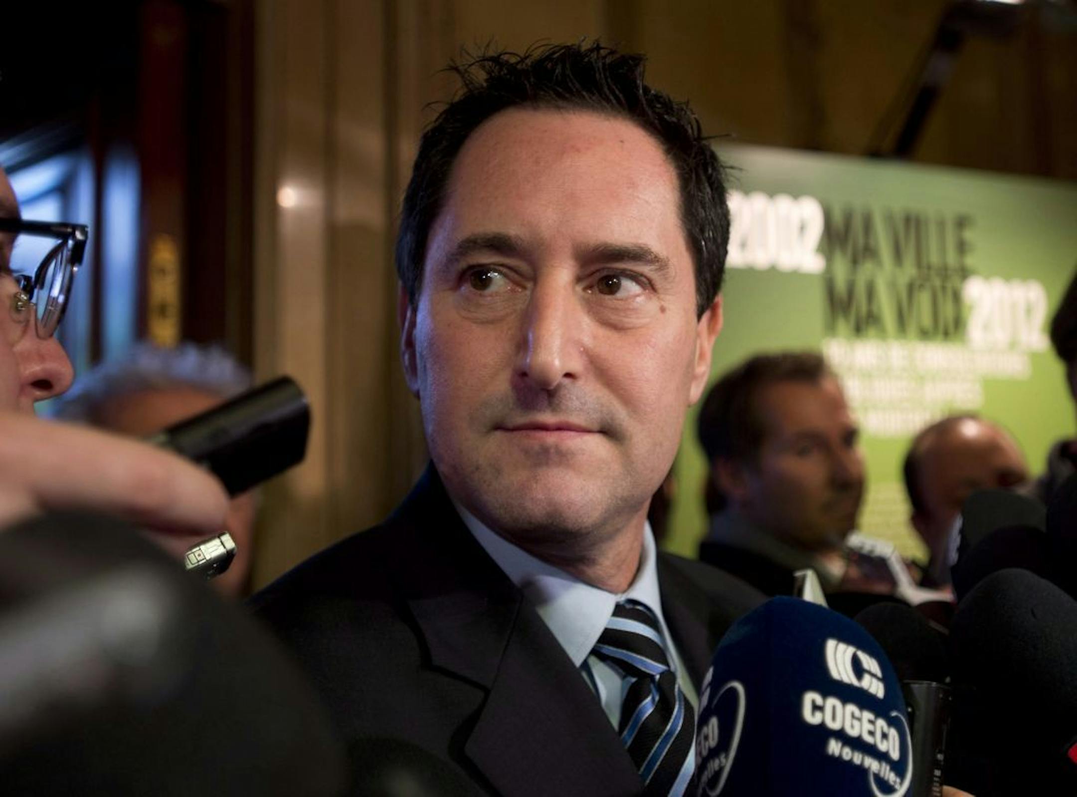 Michael Applebaum speaks to reporters in Montreal, Friday, November 16, 2012 after he was elected interim mayor of Montreal. Quebec's anti-corruption unit on Monday June 17, 2013, arrested Applebuam on charges, including defrauding government, abuse of confidence and corruption.