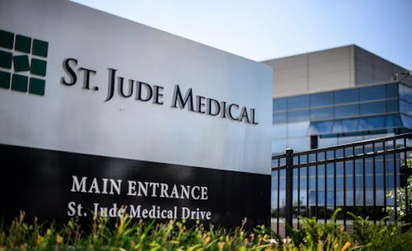 This Wednesday, July 22, 2015, photo shows St. Jude Medical corporate headquarters, in Little Canada, Minn., just north of St. Paul. Abbott Laboratori