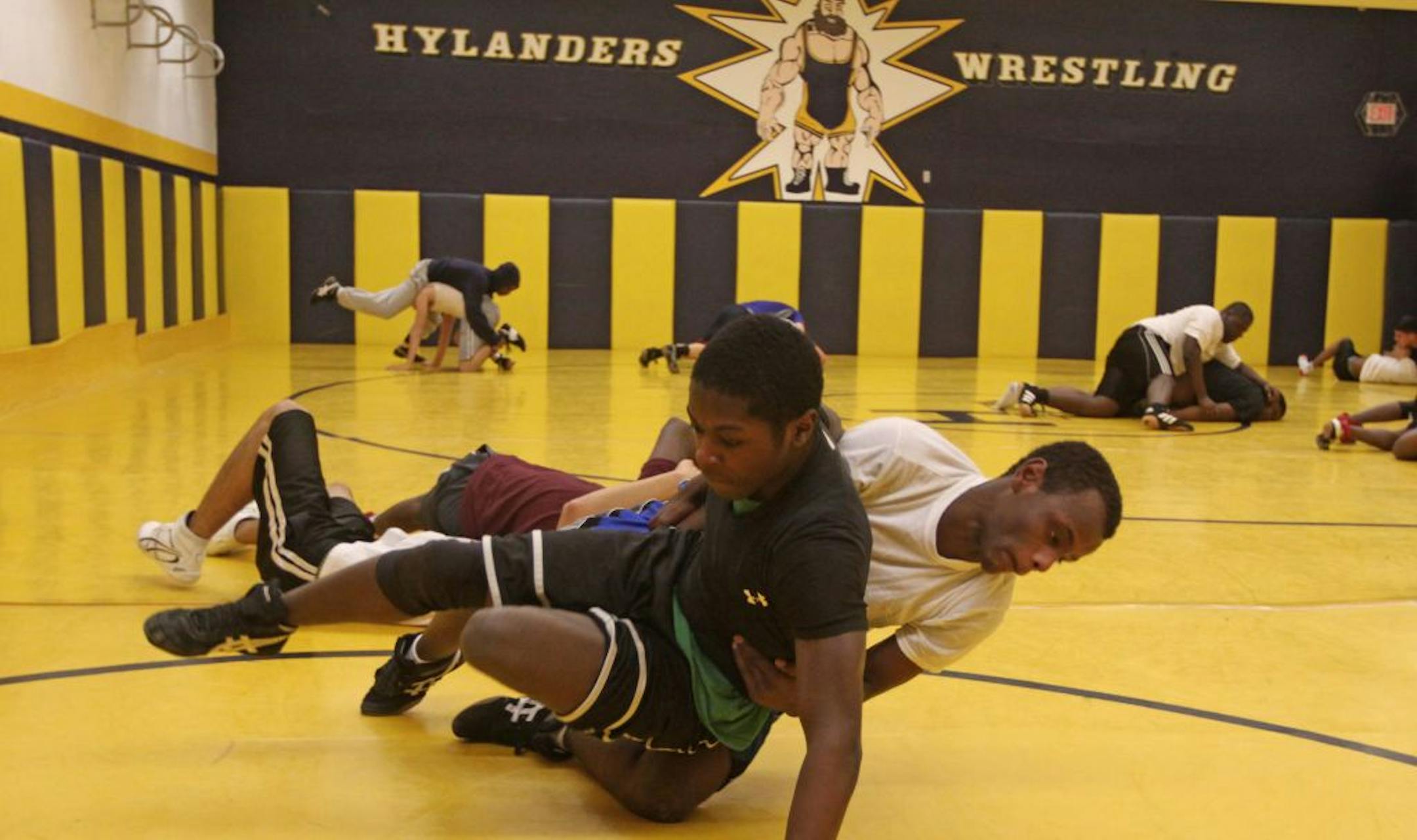 Deshon Lenear, left, the lone returning Hylanders wrestler, worked out with Khalid Jama during a recent practice at Columbia Heights High School.