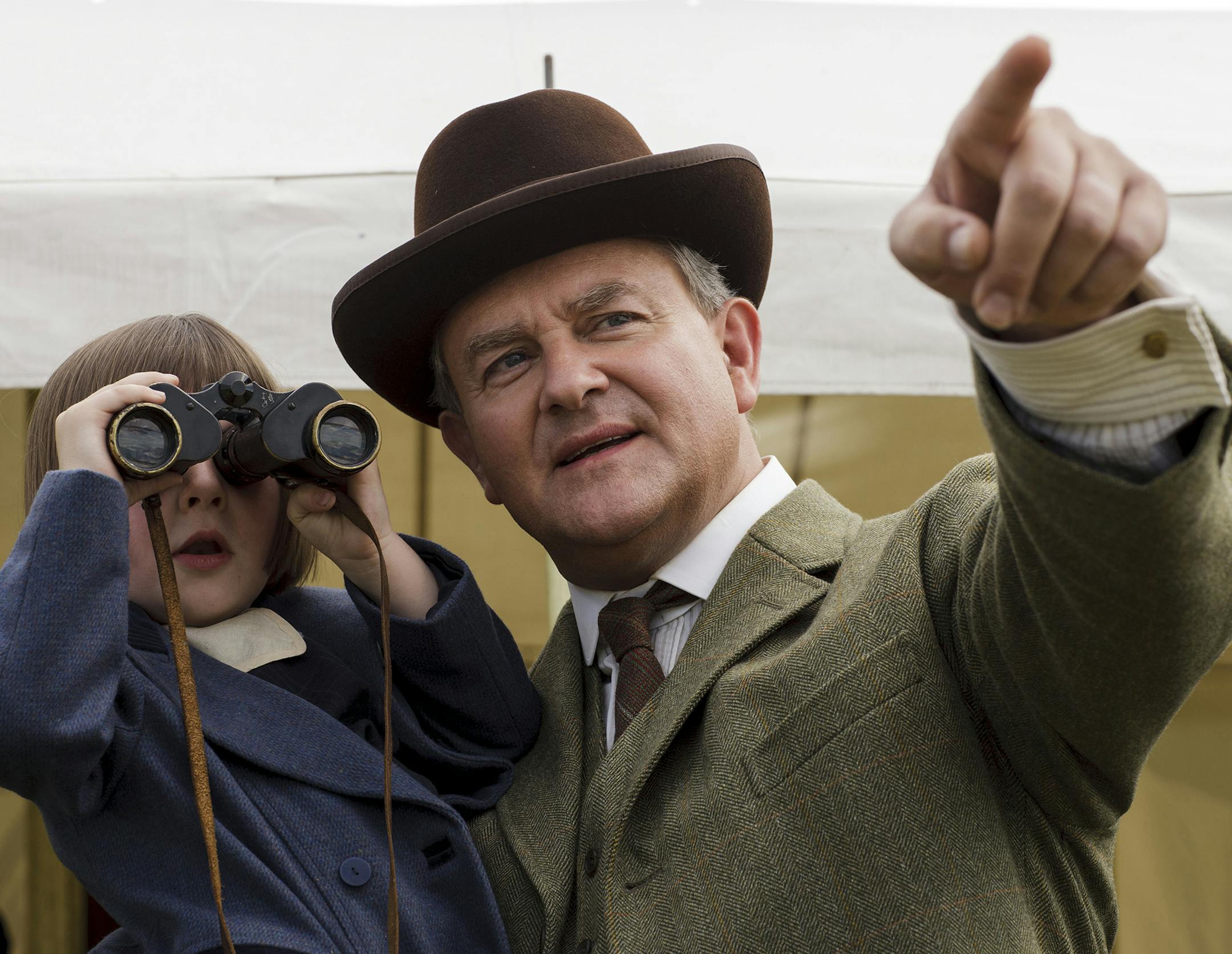 Nick Briggs/Carnival Film & Television Ltd Fifi Hart as Sybbie Branson and Hugh Bonneville as Lord Grantham in a Season 5 episode of "Downton Abbey."