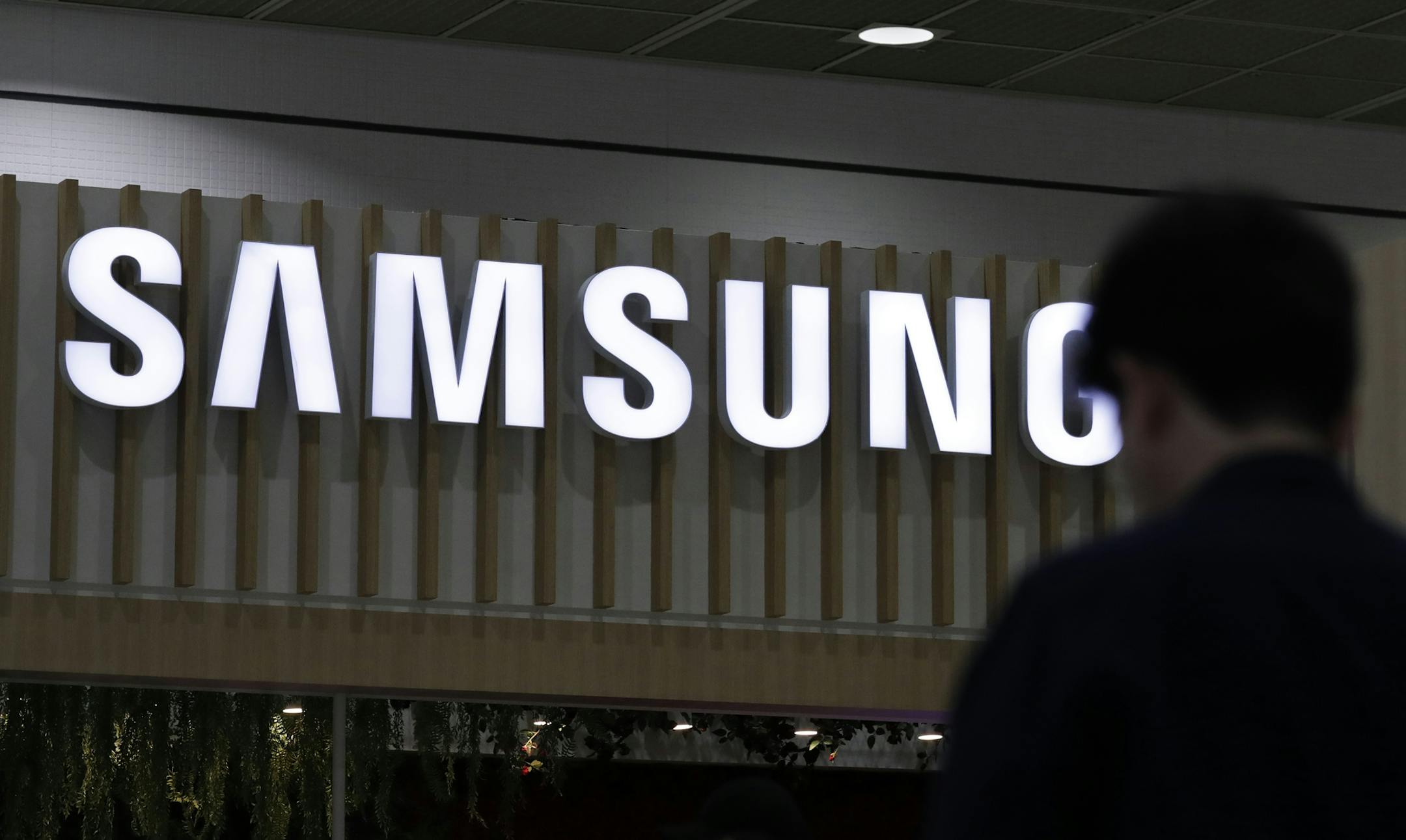 A logo of Samsung Electronics is seen at Korea Electronics Show in Seoul, South Korea, Tuesday, Oct. 8, 2019. Samsung Electronics has predicted its operating profit for the last quarter will fall by more than 56% from a year earlier amid sluggish global demand for computer chips. (AP Photo/Lee Jin-man)