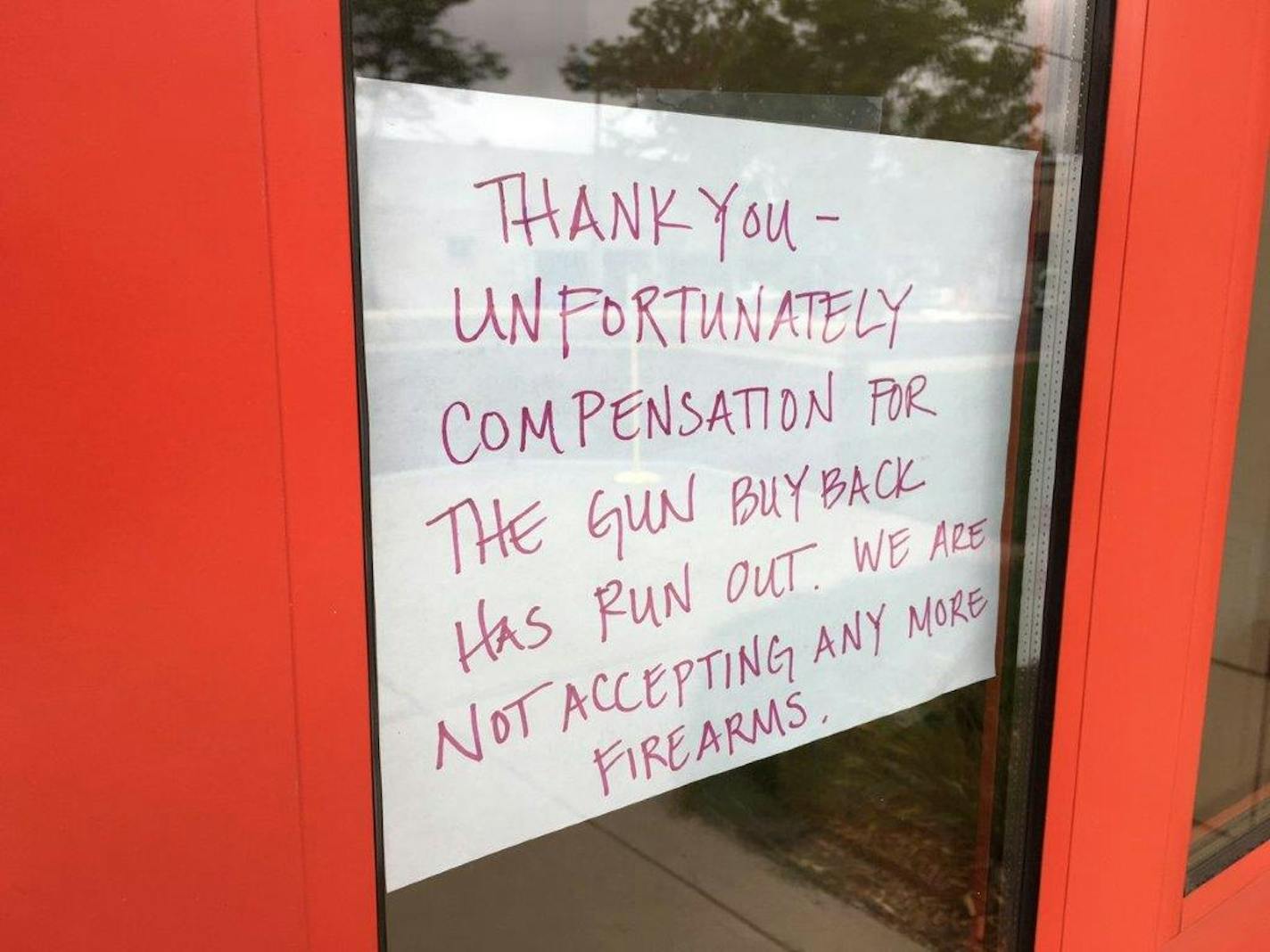 A sign posted on a south Minneapolis fire station Saturday, hours before a city-sponsored gun buyback program was supposed to end, apologized for closing early due to a big turnout.