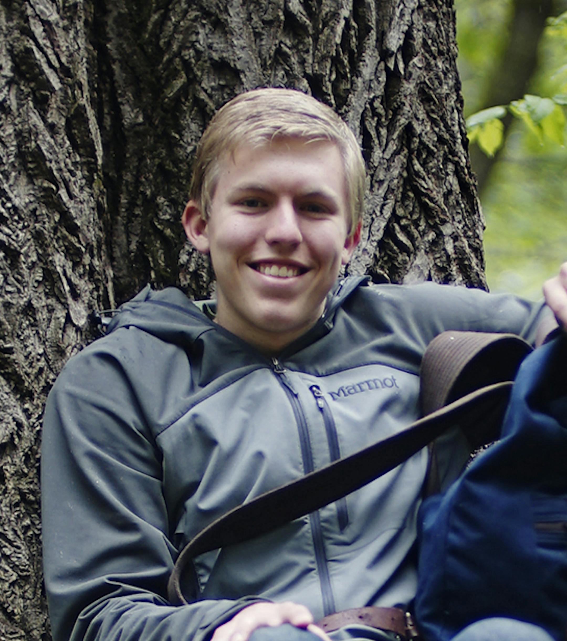 Big tree hunter Riley Smith shows off a giant butternut tree in the walnut family at Reservoir Wood Park.] Richard Tsong-Taatarii/rtsong-taatarii@startribune.com ORG XMIT: MIN1505141515240610