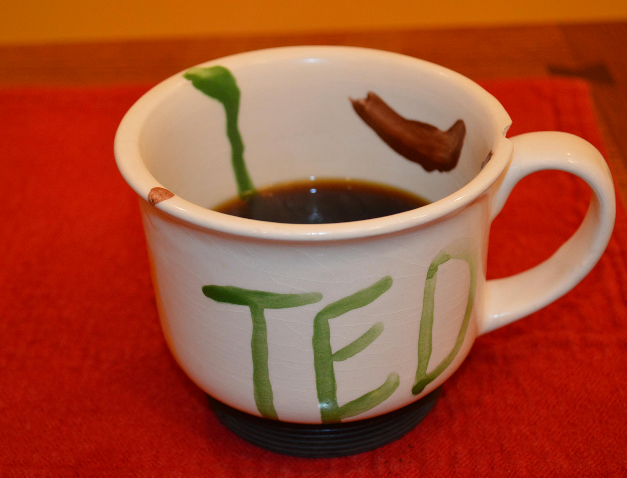 Ted Davis of St. Paul says this mug, painted in 1997 by his then-3-year-old son Gus as a birthday present, has seen him through two jobs, the launch of two businesses and Gusís entire school career through college. "It reminds me every day of that 3 year old boy and the wonderful young man he has become."