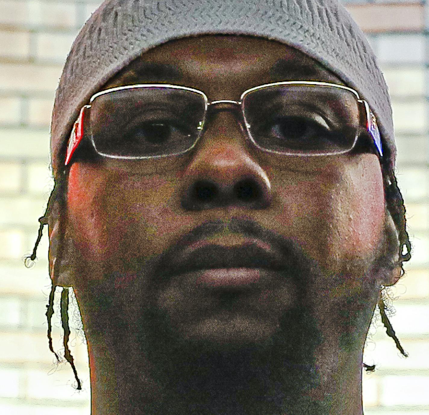 Myon Burrell, convicted in the murder of Tyesha Edwards, an 11-year-old girl pierced in the heart by a stray bullet in 2002 while doing homework at her family's dining room table, stands for a photograph at the Stillwater Correctional Facility, Wednesday, Oct. 23, 2019, in Stillwater, Minn. A growing number of legal experts, community leaders and civil rights activists are concerned that Burrell may have been wrongly convicted, as there was no gun, fingerprints or hard evidence to implicate him.