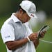 Hideki Matsuyama looked at score card on the 16 green during third round action at TPC Twin Cities Saturday July,6 2019 in Blaine, MN. ] Jerry Holt &#