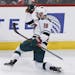 Minnesota Wild left wing Jason Zucker (16) celebrates a goal against the Chicago Blackhawks during the third period of an NHL hockey game Tuesday, Apr