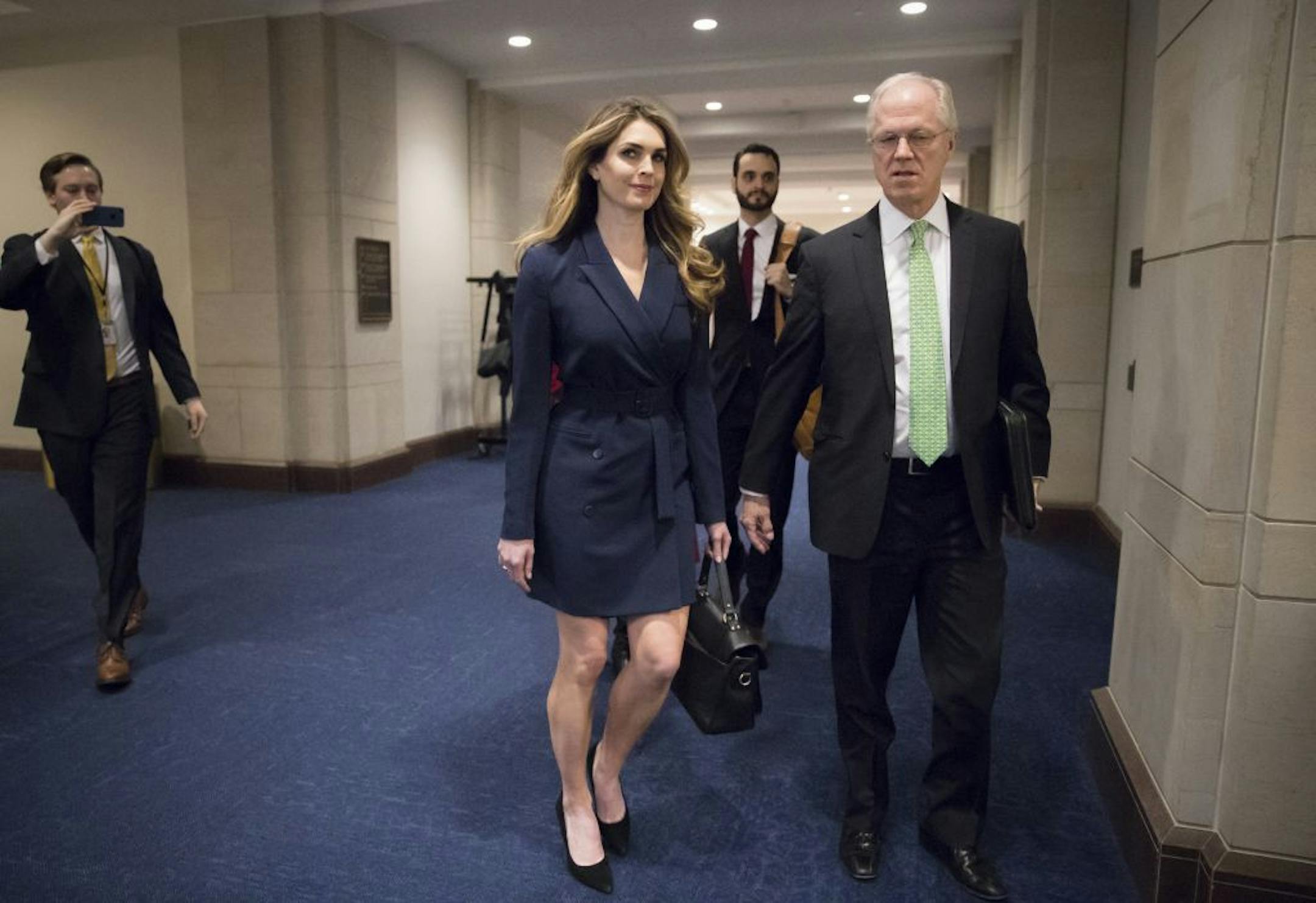 White House Communications Director Hope Hicks, center, one of President Trump's closest aides and advisers, arrives to meet behind closed doors with the House Intelligence Committee, at the Capitol in Washington, Tuesday, Feb. 27, 2018.