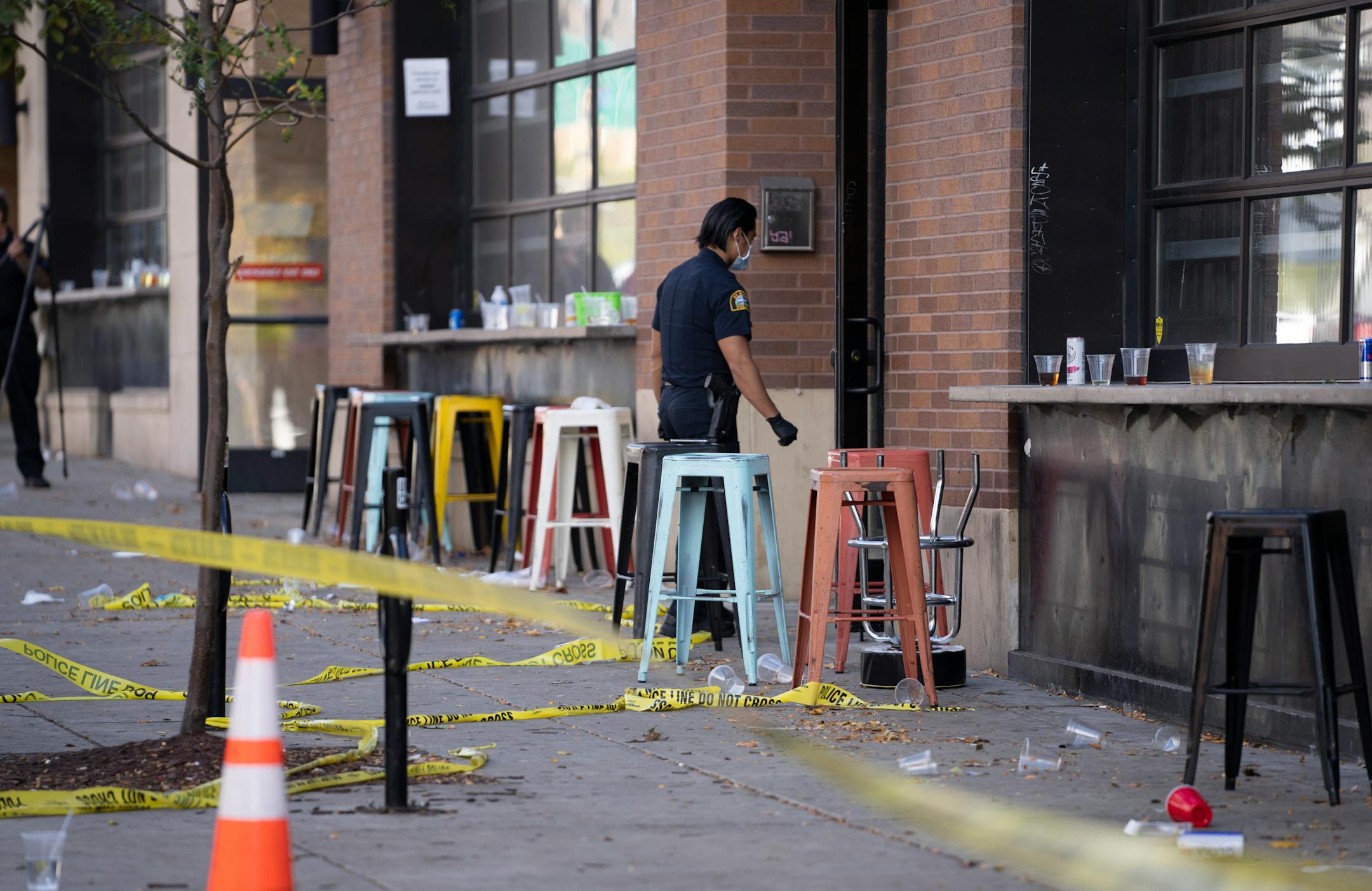 Investigators processed the chaotic scene of a multiple shooting at the bar Truck Park in St. Paul, Minn., that happened after midnight on Sunday, October 10, 2021.