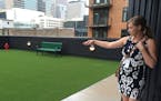 Carla Dunham, marketing manager for Alatus, showed the all-season rooftop dog park at Latitude 45 in downtown Minneapolis.