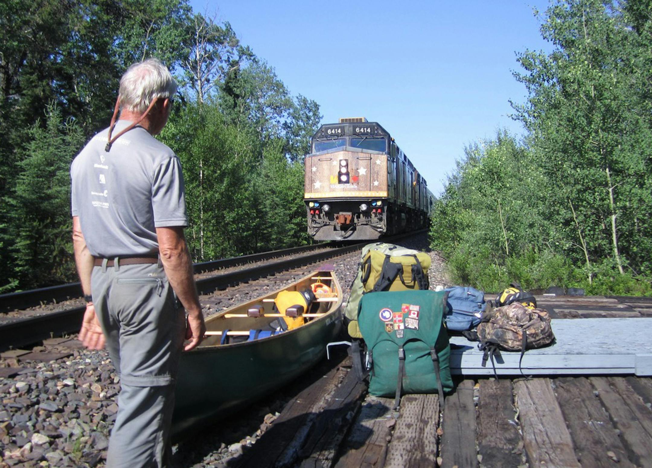 Ken Panzer waited for the train to arrive to take him and a companion deeper in the Wabakimi region.