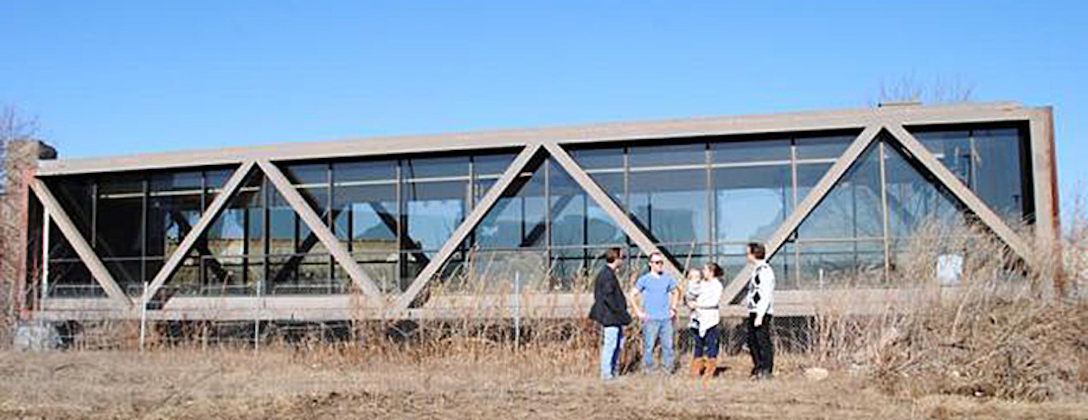 The architects and the family standing in front of the skyway ORG XMIT: fcgnIIFbtAajr_XUfUd1