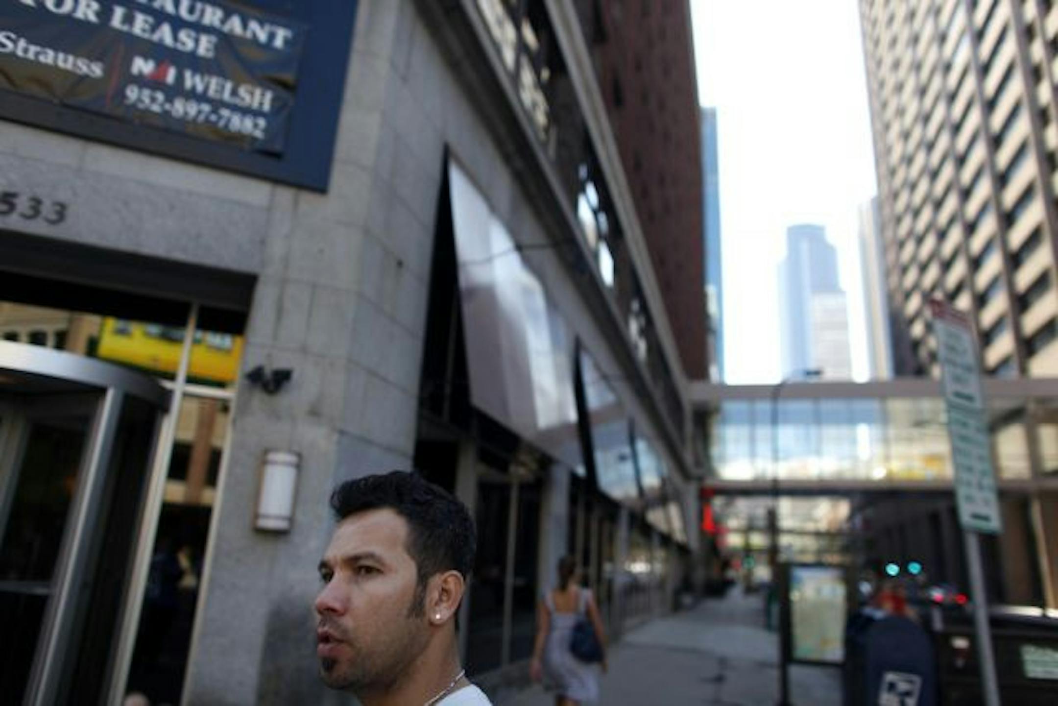 Thom Pham outside of his new restaurant at 6th and Hennepin.