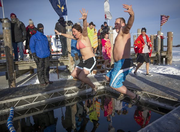 To celebrate the New Year, Minnesotans braved the frigid temperatures and Lake Minnetonka for the 29th Annual ALARC Ice Dive from the from the shoreli