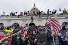 Pro-Trump supporters pushed back against police at the U.S. Capitol in Washington, D.C., on Jan. 6. 
