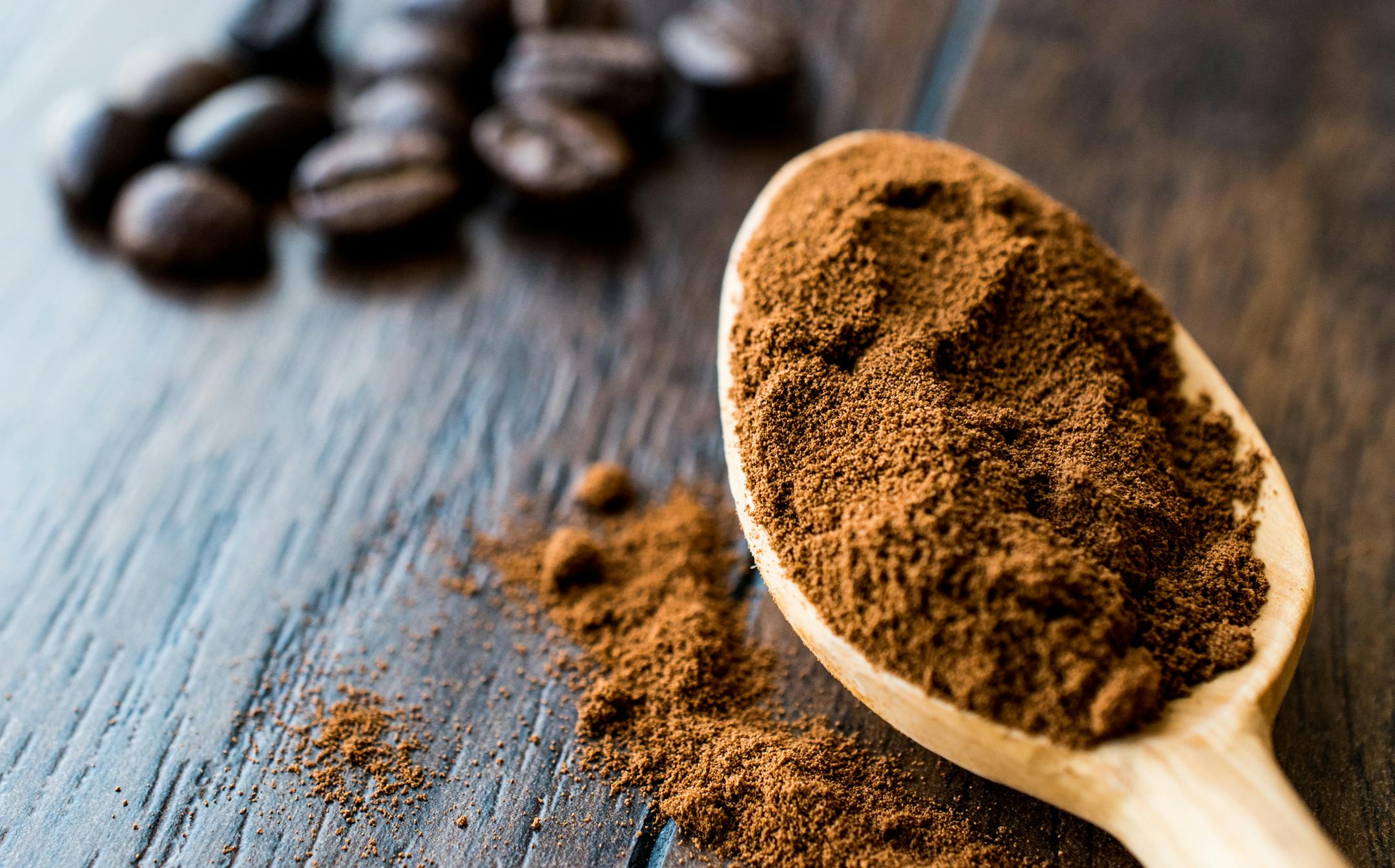 istock
instant espresso powder in wooden spoon.