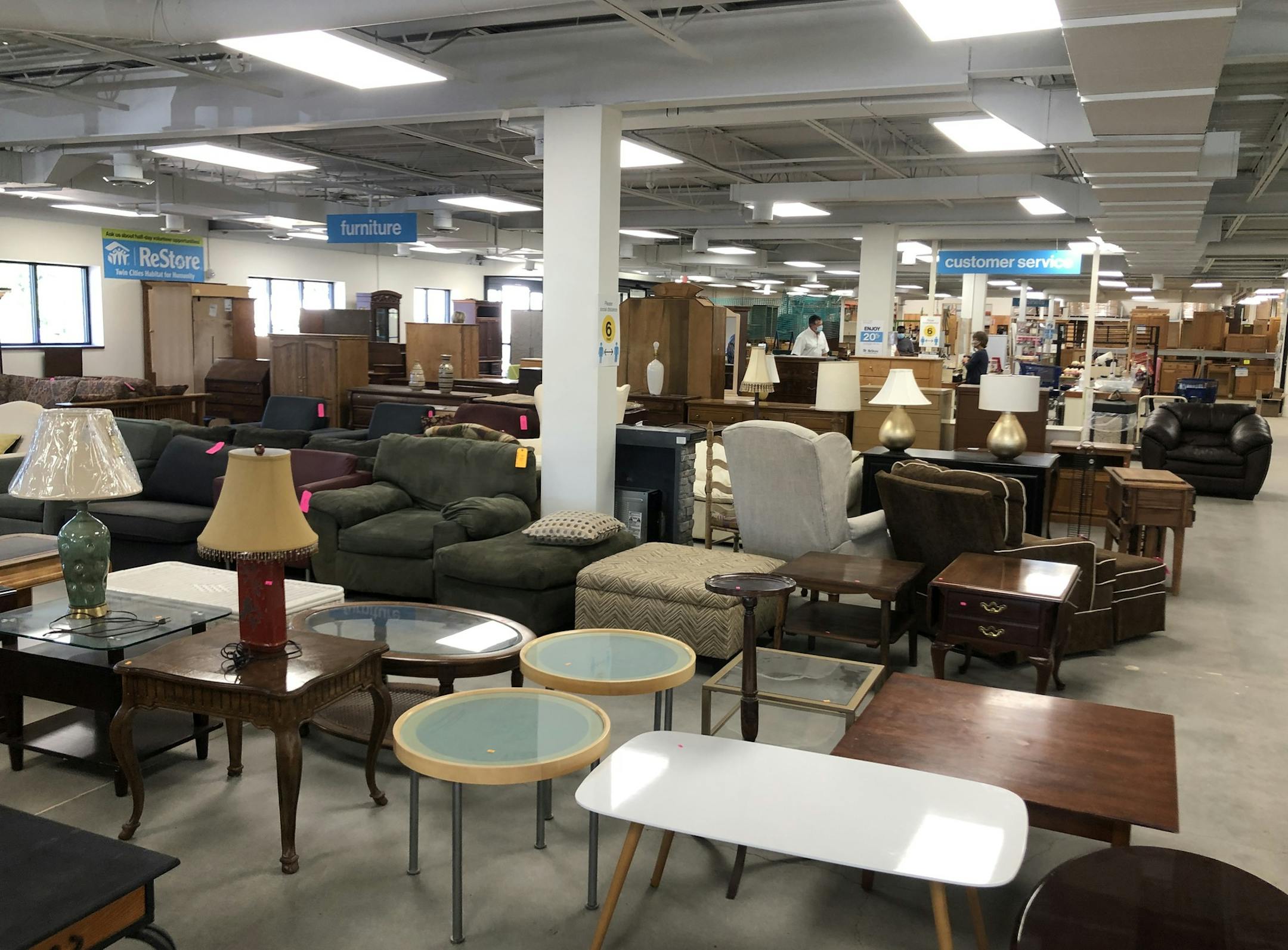 The furniture department at ReStore's New Brighton store has expanded with areas for items such as lighting and appliances. (JOHN EWOLDT/Star Tribune)
