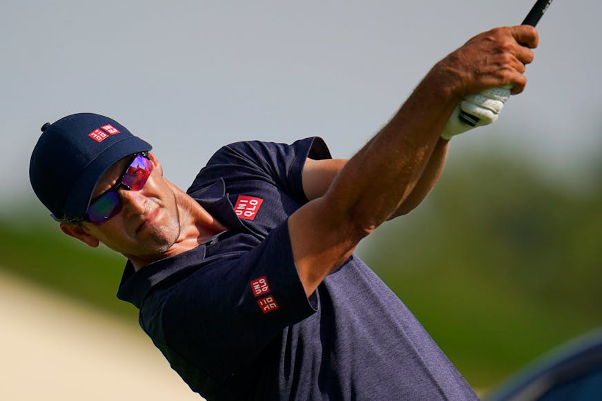 Adam Scott watches his shot on the 15th tee during the second round of the BMW Championship