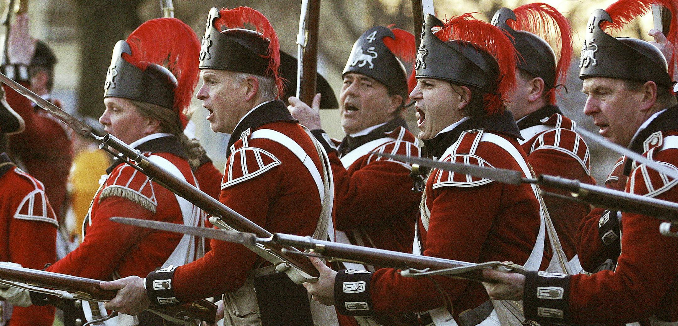 Actors depicted British troops during a recent re-enactment of a Revolutionary War battle in Massachusetts. The Brits paid a high price for their 1775 win at Bunker Hill.