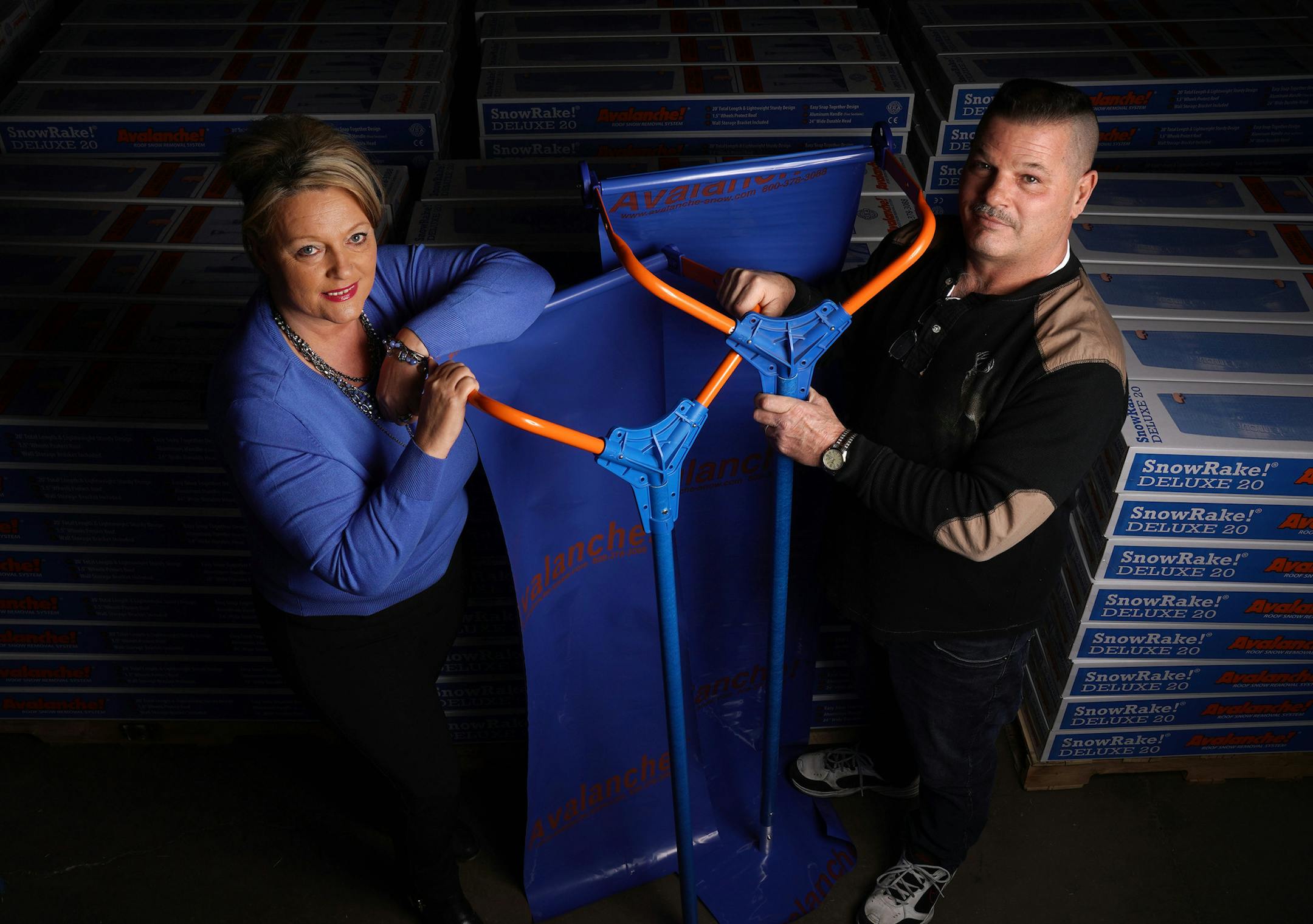 Linda and Chris Robasse stood for a portrait with their Avalanche snow removal tool Thursday at their production facility in Maple Lake. ] ANTHONY SOUFFLE &#x2022; anthony.souffle@startribune.com Linda and Chris Robasse stood for a portrait with their Avalanche snow removal tool Thursday, March 14, 2019 at their production facility in Maple Lake, Minn. The record snow has pretty much exhausted their inventory of the Minnesota-made roof rakes and snow removal tools. They've taken the business fro