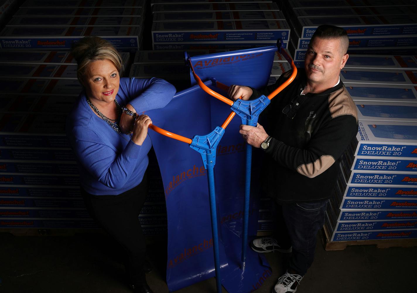 Linda and Chris Robasse stood for a portrait with their Avalanche snow removal tool Thursday at their production facility in Maple Lake. ] ANTHONY SOUFFLE &#x2022; anthony.souffle@startribune.com Linda and Chris Robasse stood for a portrait with their Avalanche snow removal tool Thursday, March 14, 2019 at their production facility in Maple Lake, Minn. The record snow has pretty much exhausted their inventory of the Minnesota-made roof rakes and snow removal tools. They've taken the business fro