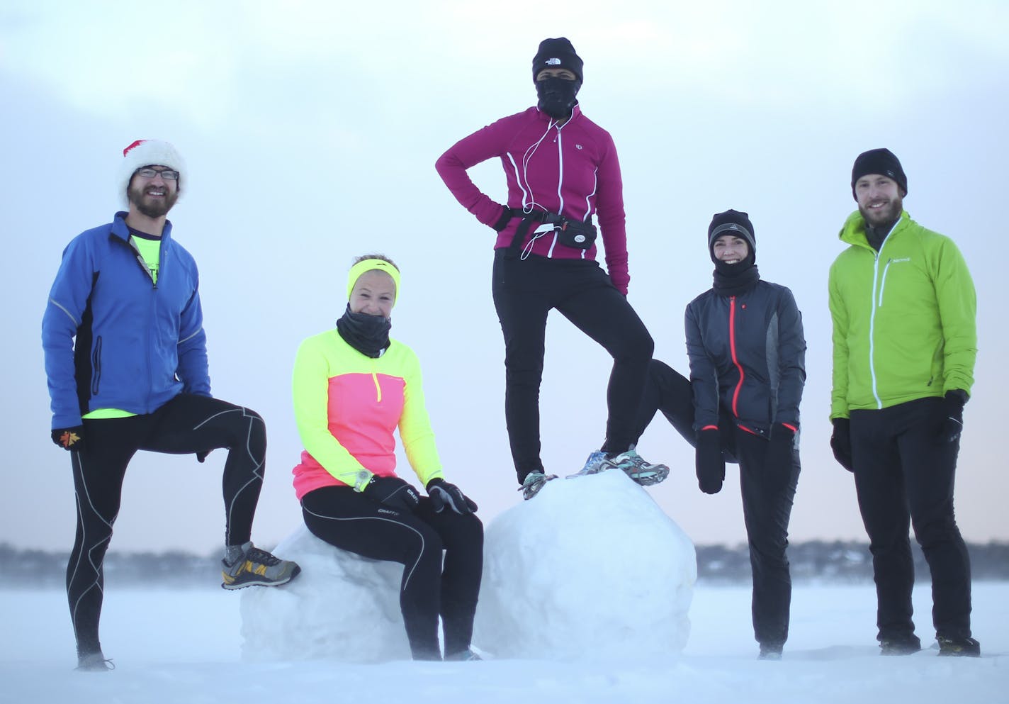 Runners who offered cold weather training tips gathered in sub-zero wind chills for a portrait on the surface of Lake Harriet Sunday afternoon, January 26, 2014 in Minneapolis. They are, from left, Ben Drexler, Jessie Benson, Rupa Ryan, Caryn Mohr, and Ben Neeser. ] JEFF WHEELER &#x201a;&#xc4;&#xa2; jeff.wheeler@startribune.com