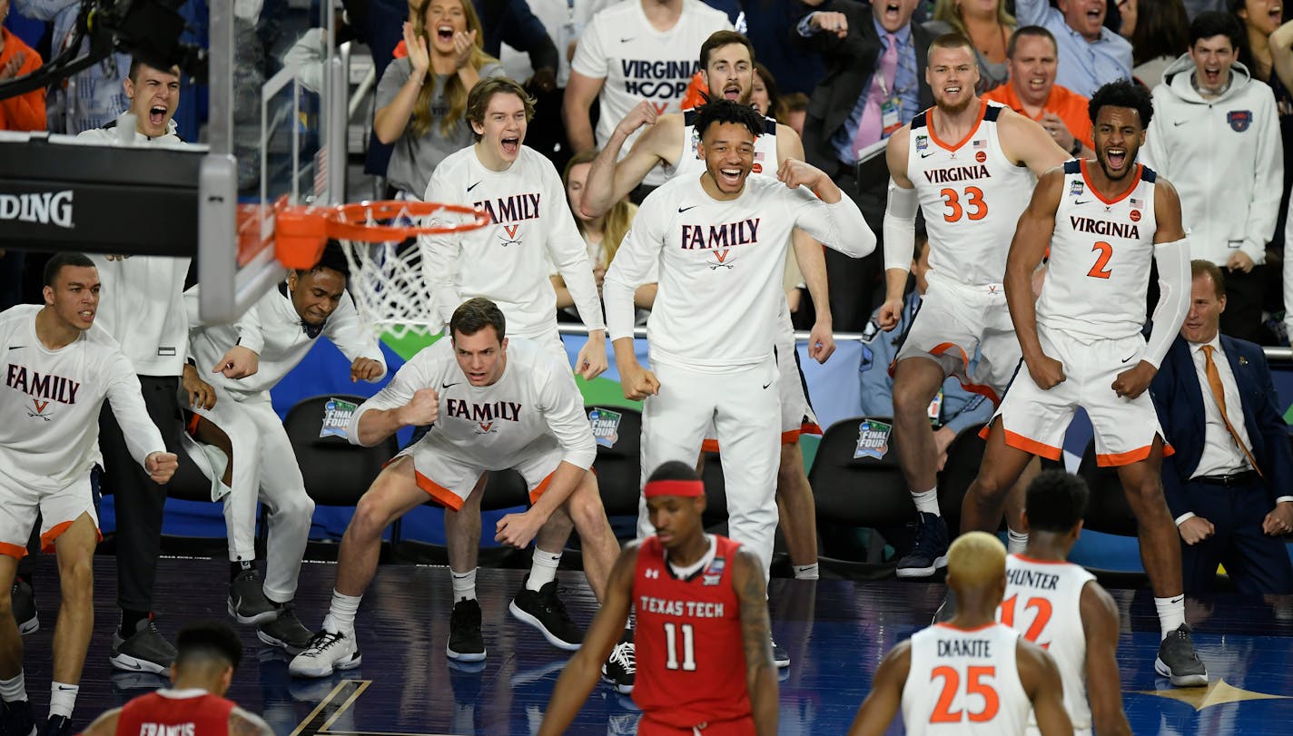 Virginia's bench erupted after De'Andre Hunter scored and got the foul during the second half.