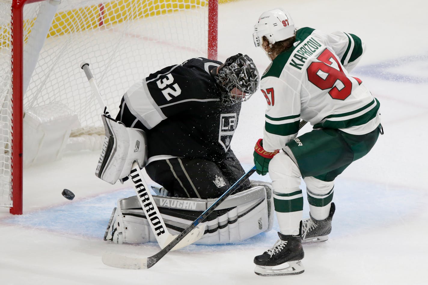 Wild left wing Kirill Kaprizov scores against Los Angeles Kings goaltender Jonathan Quick during overtime