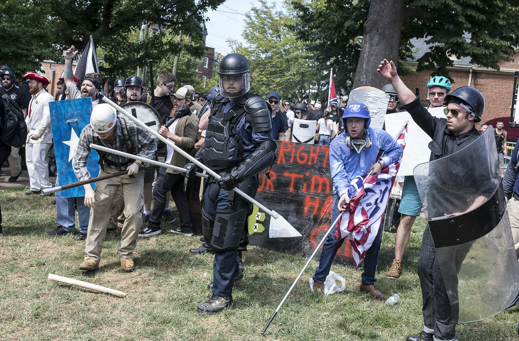 FILE -- Far right demonstrators during the "Unite the Right" event in Charlottesville, Va., Aug. 12, 2017. Attorney General Jeff Sessions said on Monday that the &#xec;evil attack&#xee; in Charlottesville, Va., over the weekend meets the legal definition of an act of domestic terrorism, an early declaration in an investigation after a car plowed into a crowd of protesters. (Edu Bayer/The New York Times) ORG XMIT: MIN2017081513430314