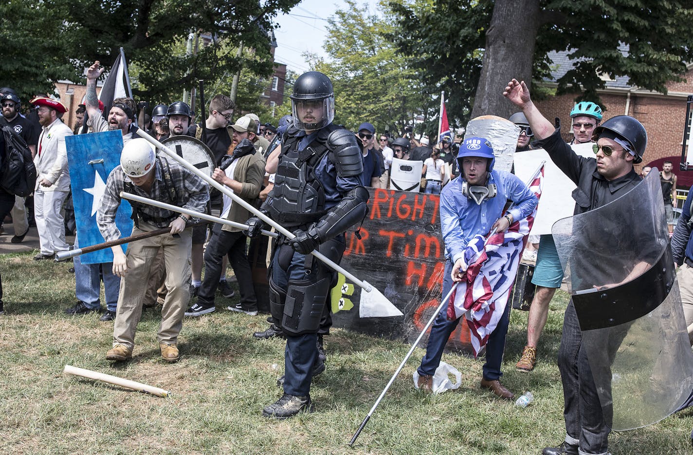 FILE -- Far right demonstrators during the "Unite the Right" event in Charlottesville, Va., Aug. 12, 2017. Attorney General Jeff Sessions said on Monday that the &#xec;evil attack&#xee; in Charlottesville, Va., over the weekend meets the legal definition of an act of domestic terrorism, an early declaration in an investigation after a car plowed into a crowd of protesters. (Edu Bayer/The New York Times) ORG XMIT: MIN2017081513430314