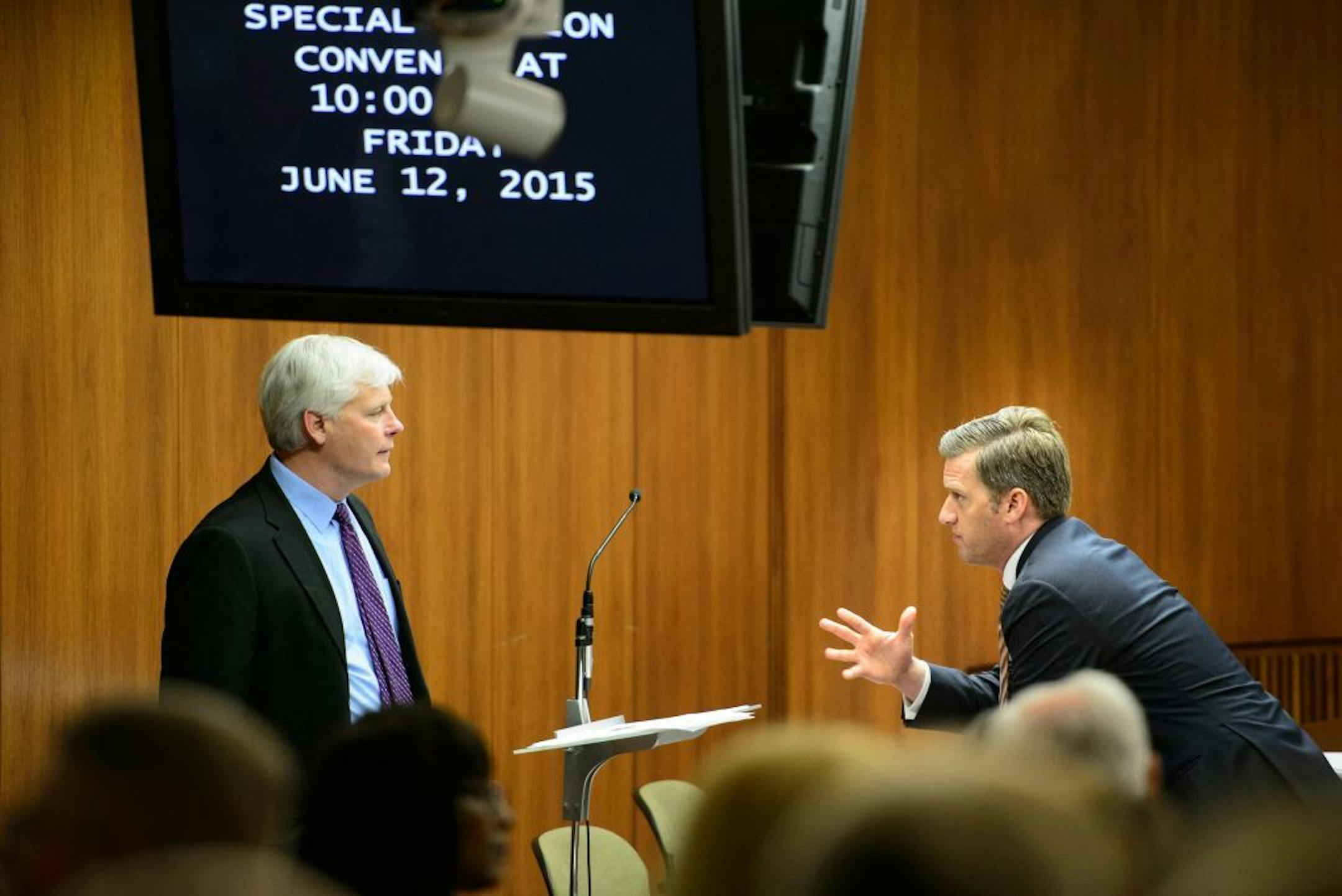 House Speaker Kurt Daudt, right conferred with Minority Leader Paul Thissen at the beginning of the special session.