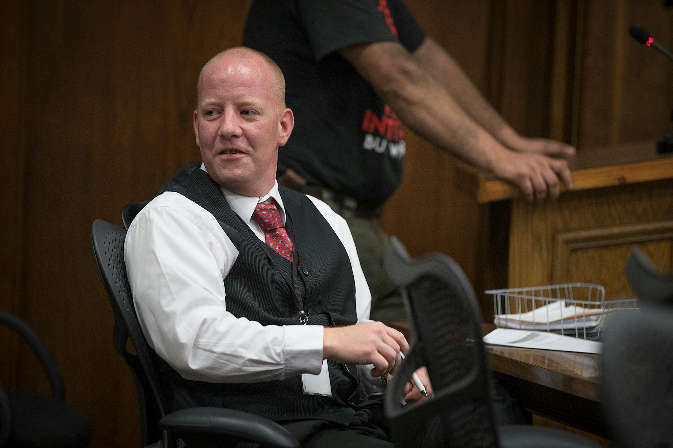 Probation officer Russell Spurrier worked with Duluth Judge Shaun Floerke as they checked in with defendants during DWI court, Friday, August 11, 2017 in Duluth, MN.