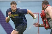 Joe Alt, left, an offensive lineman from Totino-Grace High School and Notre Dame, has been working out locally six days a week alongside NFL veterans 