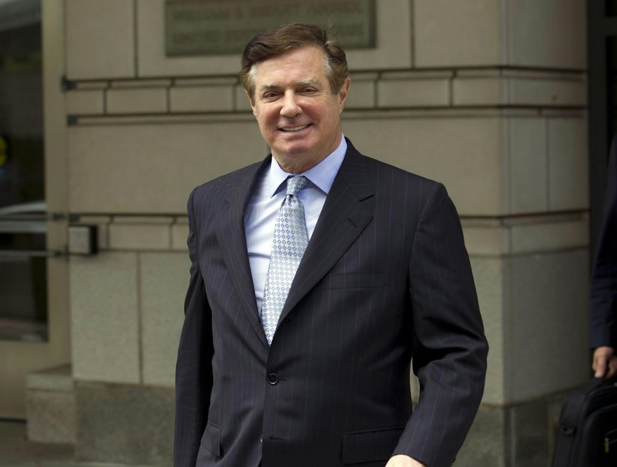 FILE - In this May 23, 2018, file photo, Paul Manafort, President Donald Trump's former campaign chairman, leaves the Federal District Court after a hearing in Washington.