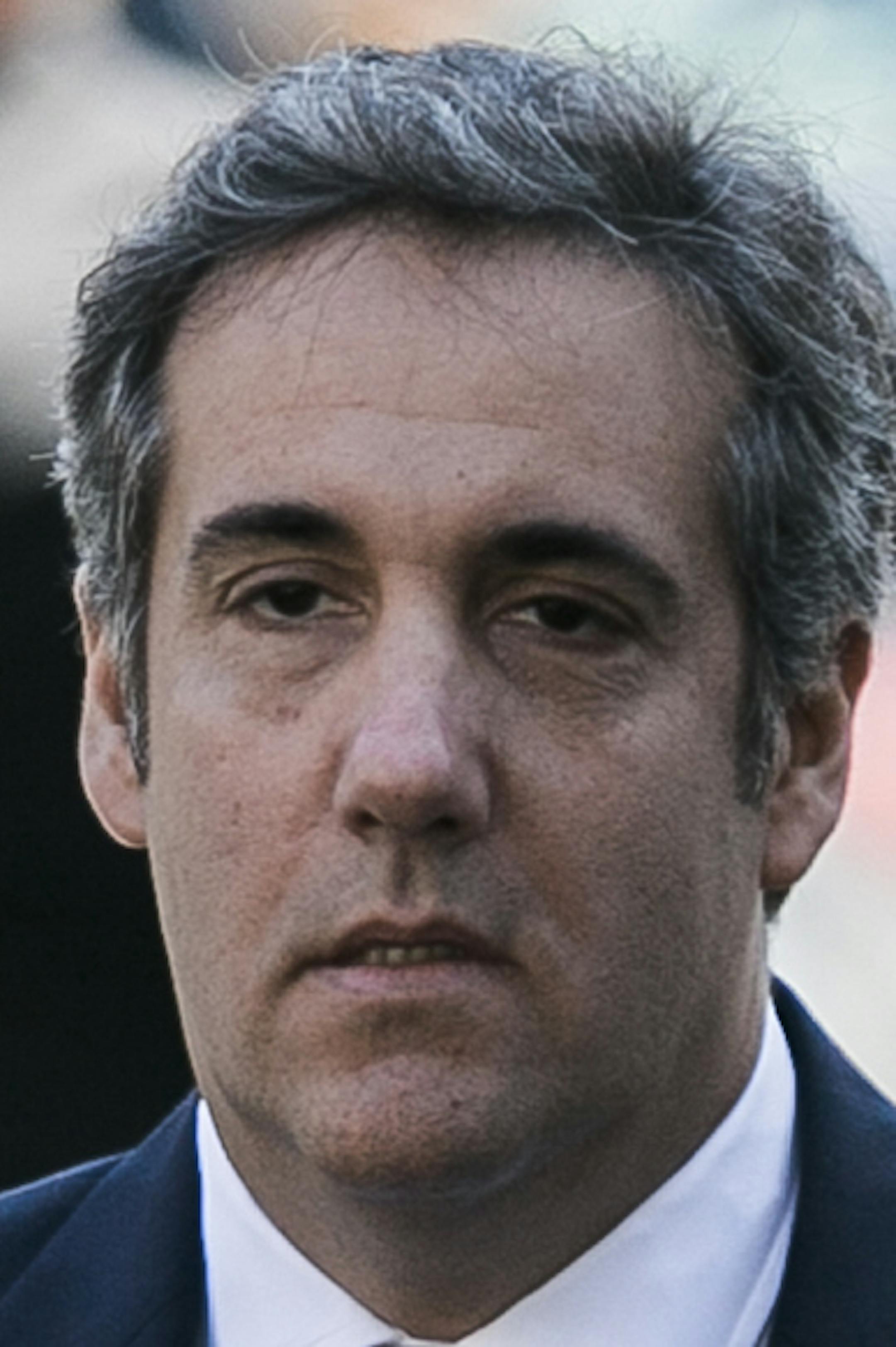 Michael Cohen, center, President Donald Trump's longtime lawyer, arrives at federal court in New York, April 26, 2018. (Jeenah Moon/The New York Times)