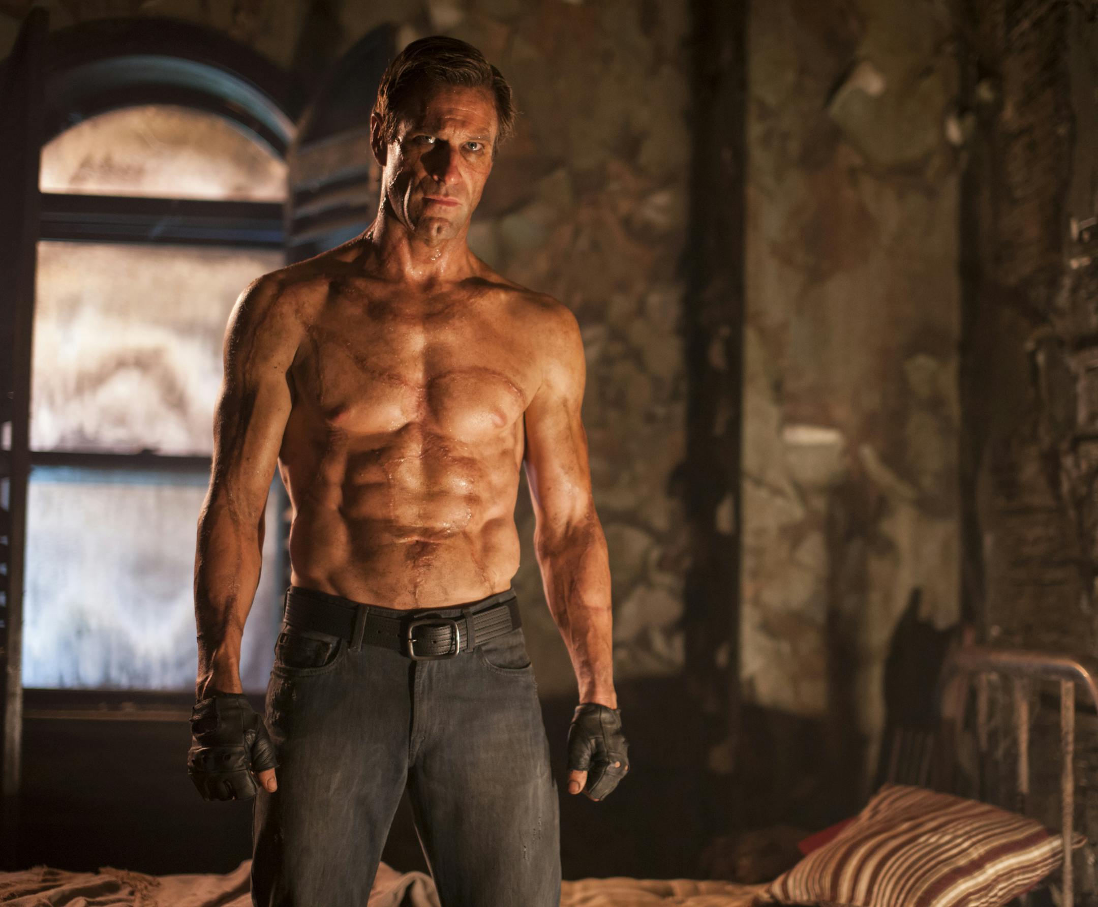 This image released by Lionsgate shows Aaron Eckhart in a scene from "I, Frankenstein." (AP Photo/Lionsgate, Ben King)