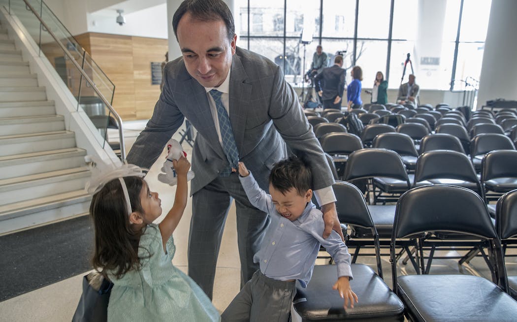 Minnesota Timberwolves new President of basketball operations Gersson Rosas was greeted by his tired 3-year-old twins Giana, left, and Grayson
