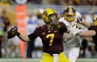 Gophers quarterback Mitch Leidner threw during the first half against Central Michigan in the Quick Lane Bowl in Detroit.