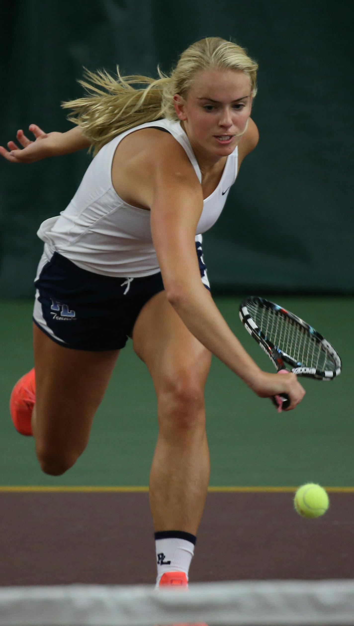 Prior Lake's Grace Petersen Raced down a short ball during her match against Princeton's Anna Dahlen. ] (KYNDELL HARKNESS/STAR TRIBUNE) kyndell.harkness@startribune.com Prior Lake vs Princeton girls class AA quarter finals in Minneapolis Min., Tuesday October 27, 2015.