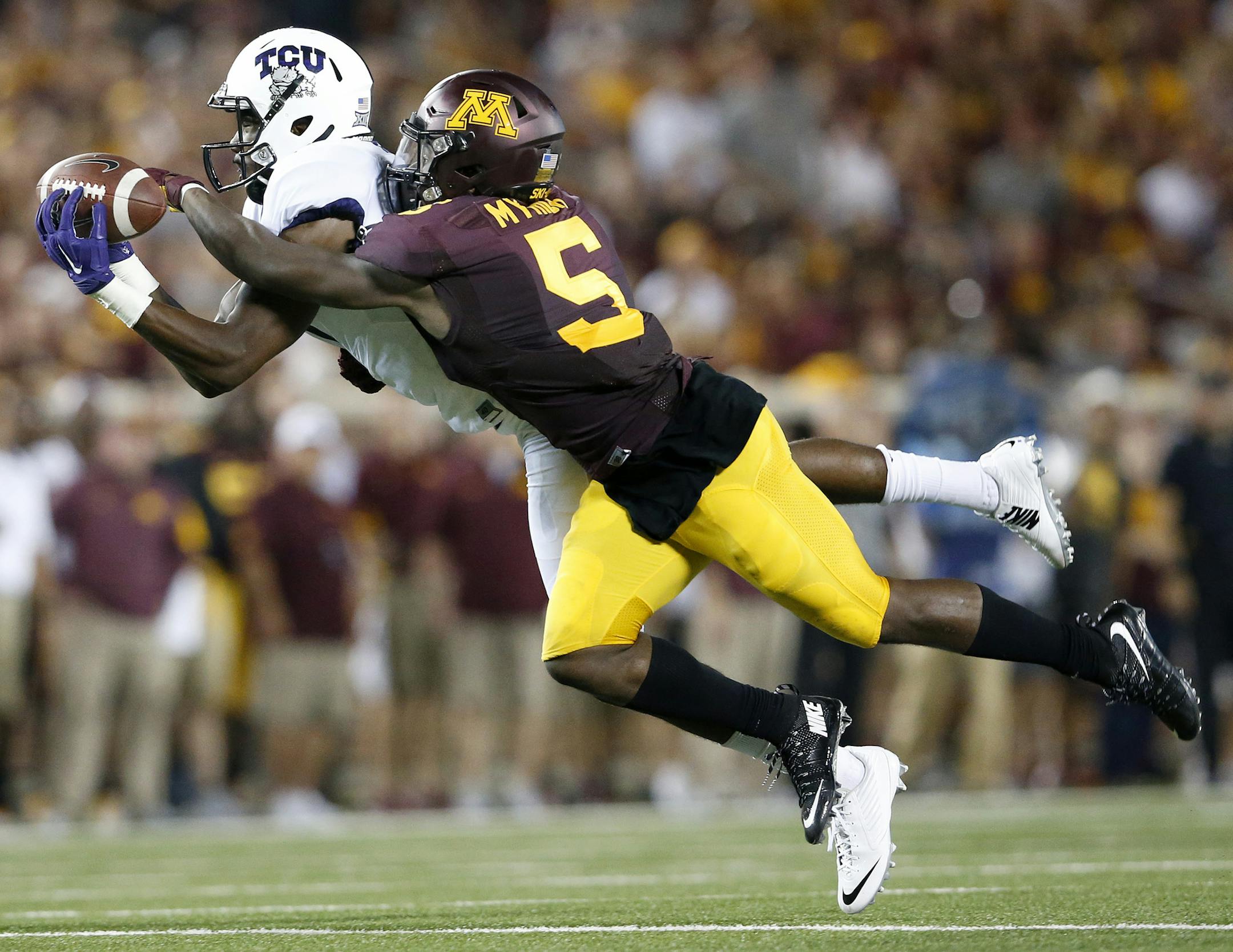 Jalen Myrick (5) broke up a pass intended for Emanuel Porter (1) in the second quarter. ] CARLOS GONZALEZ cgonzalez@startribune.com - September 3, 2015, Minneapolis, MN, TCF Bank Stadium, NCAA Football, Big 10, University of Minnesota Golden Gophers vs. Texas Christian University TCU Horned Frogs