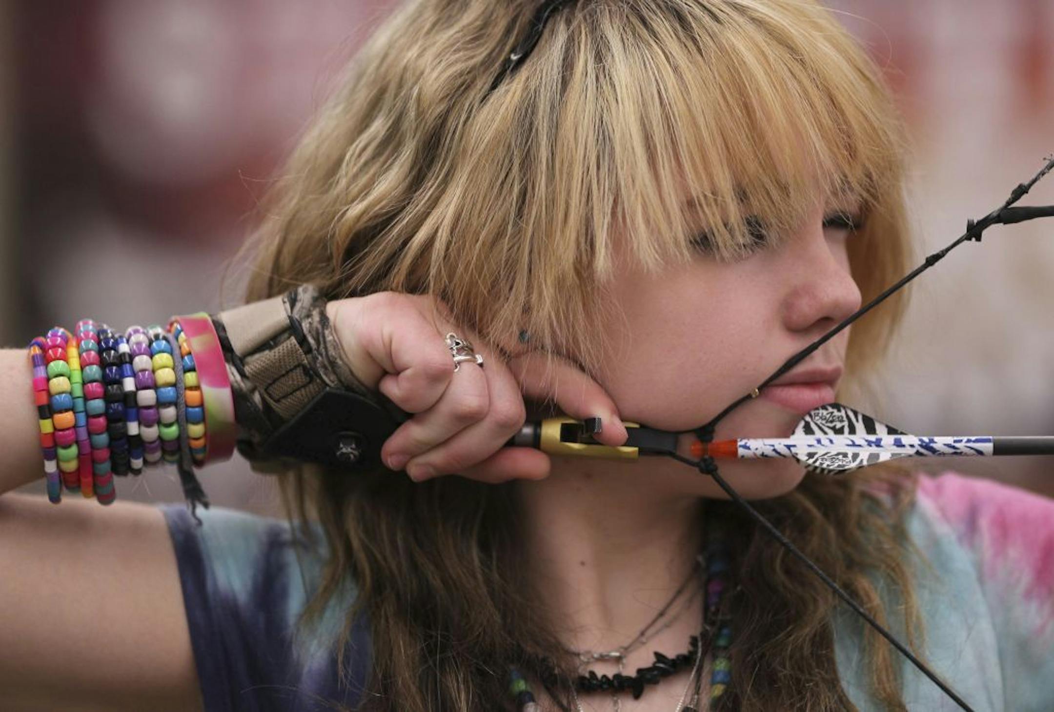 Maddy Kowalczyk, 14, of Champlin, took aim while shooting in the youth league at Average Joes Archery in Coon Rapids.
