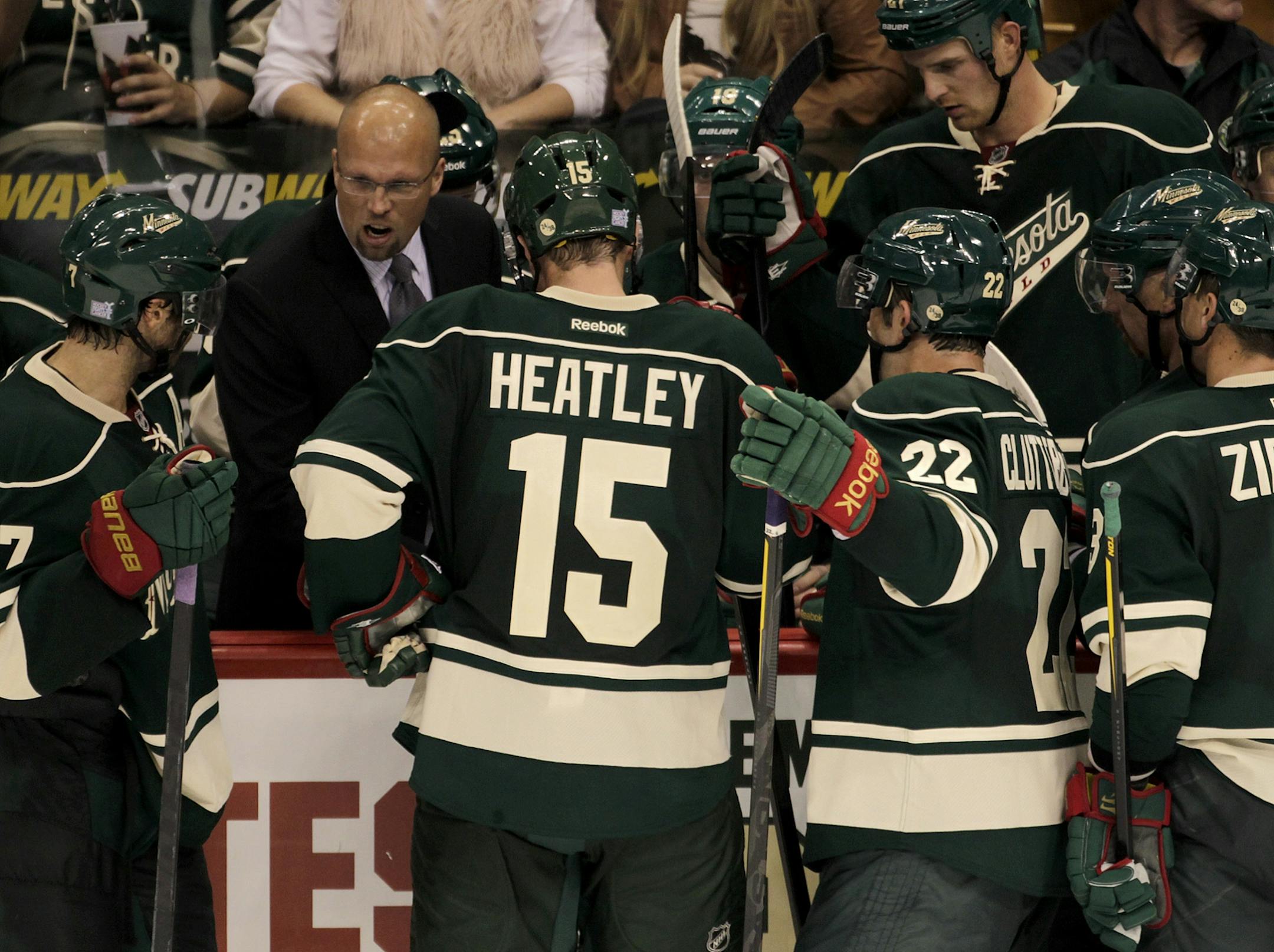 TOM WALLACE • twallace@startribune.com _ The Wild Home opener at the Xcel Center vs the Columbus Blue Jackets. MIKE YEO, HEAD COACH OF THE MINNESOTA WILD GIVES INSTRUCTIONS IN THE FINAL SECONDS OF HIS FIRST WIN AT, the Wild Home opener. [ _ Assignments #20019855E_ October 8, 2011_ SLUG: wild1009_ EXTRA INFORMATION: Name(CQ) from the mom.