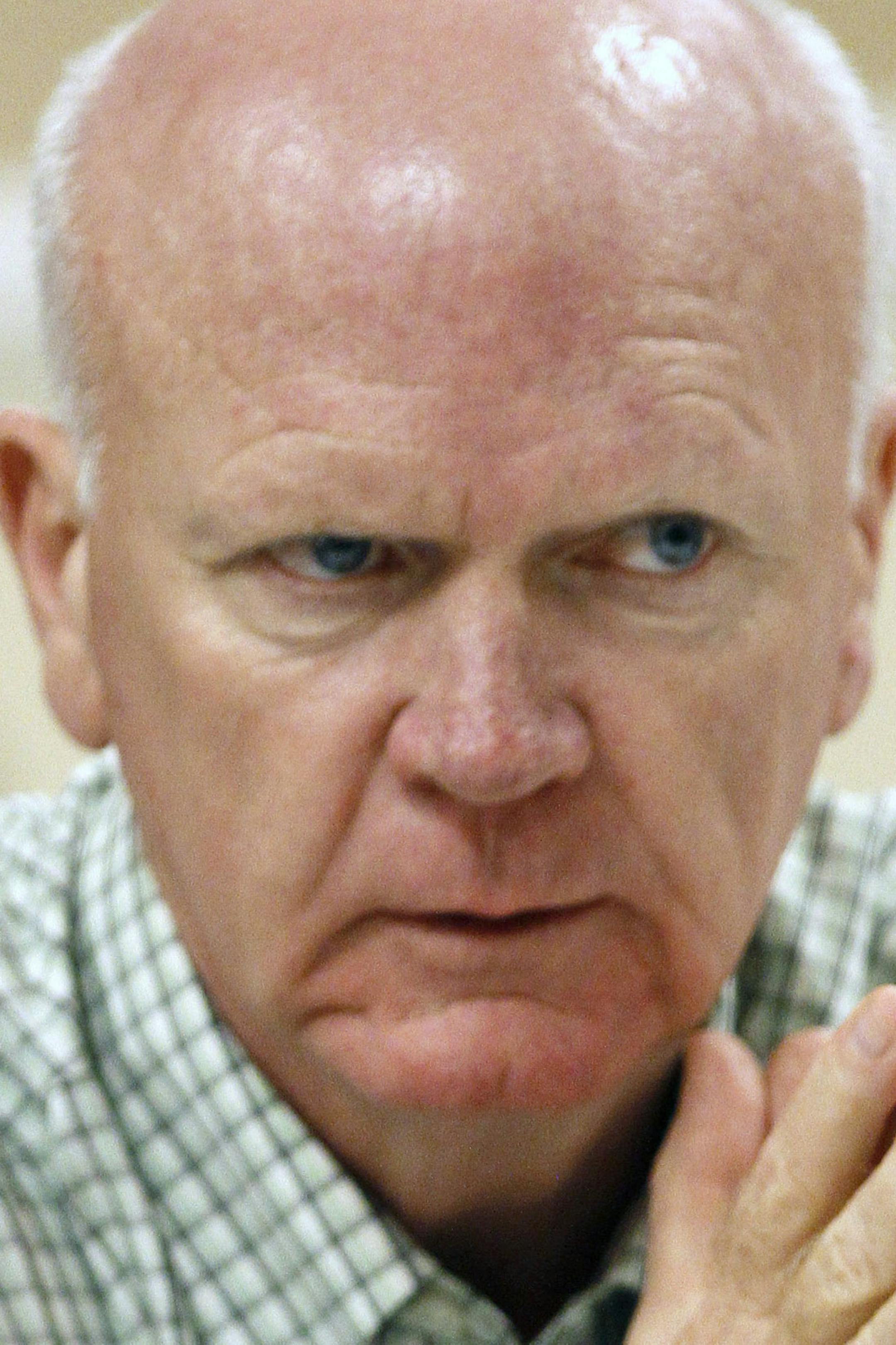 FILE - In this Nov. 12, 2013 file photo, Minnesota Twins general manager Terry Ryan talks with the media at the annual baseball general managers meeting in Orlando, Fla. Ryan has been diagnosed with cancer. He will not be with the team for the start of spring training so he can focus on treatment and recovery. The Twins released a statement from Ryan on Monday, Feb. 10, 2014, describing the recent discovery of a lump in his neck by the team physician during a routine annual physical. (AP Photo/R