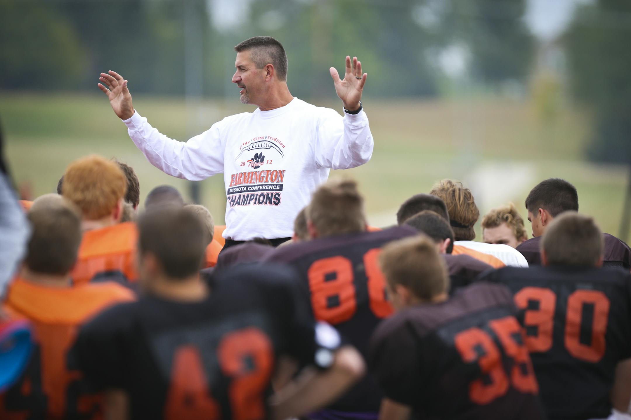 Coach Mark Froehling spoke to the team during practice at Farmington High School on Wednesday, September 18, 2013, in Farmington, Minn. ] (RENEE JONES SCHNEIDER • reneejones@startribune.com)