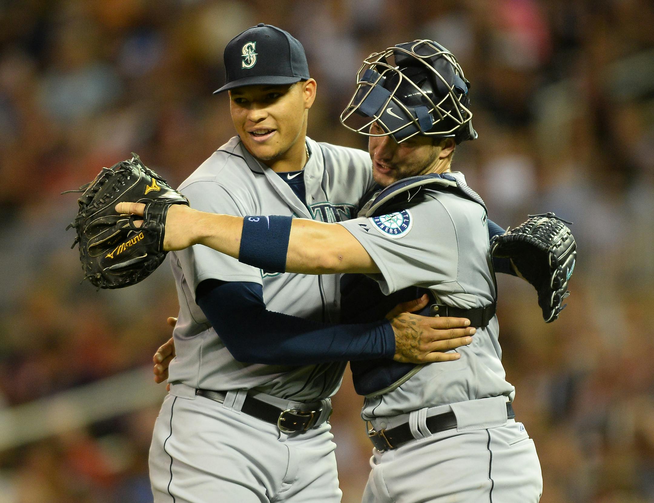Seattle Mariners starting pitcher Taijuan Walker (32) hugged catcher Mike Zunino (3) after their 6-1 victory over Minnesota Friday night. ] Aaron Lavinsky • aaron.lavinsky@startribune.com The Minnesota Twins play the Seattle Mariners on Friday, July 31, 2015 at Target Field in Minneapolis, Minn.