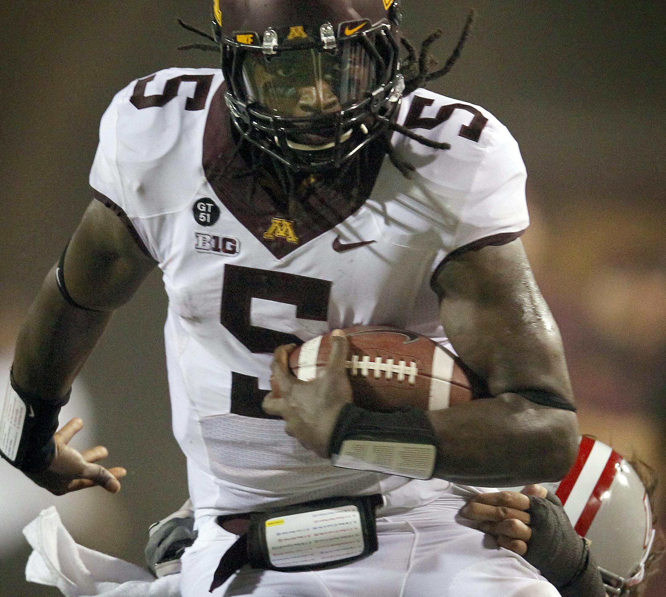 Minnesota quarterback MarQueis Gray (5) during a run in the fourth quarter. ] CARLOS GONZALEZ cgonzalez@startribune.com - August 30, 2012, Las Vegas, Henderson, Nevada, NCAA Football, Sam Boyd Stadium, University of Minnesota Gophers vs. UNLV Rebels ORG XMIT: MIN1208310311095231