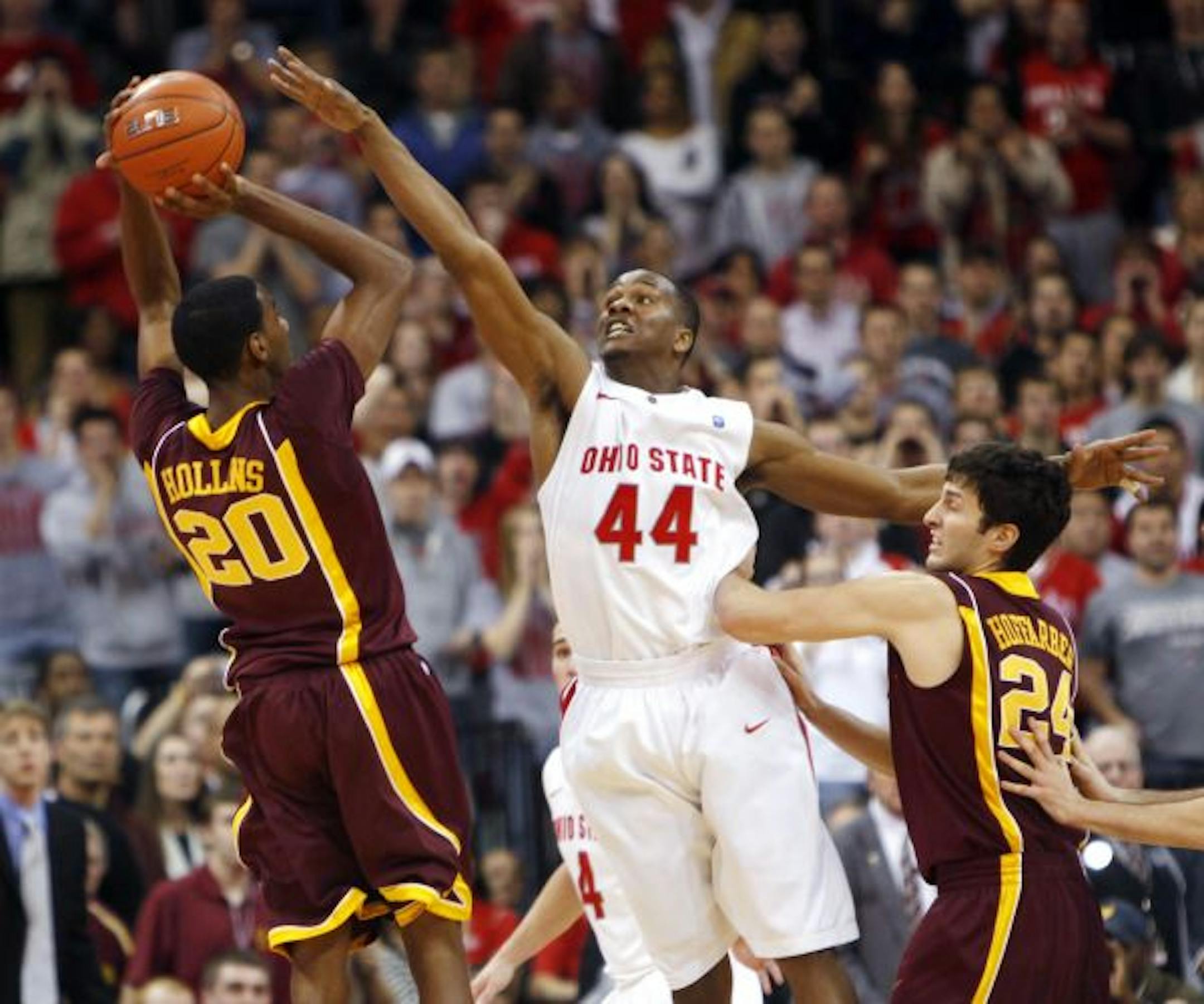 Gophers freshman Austin Hollins tried to tie the score with a three-pointer with two seconds and Ohio State's William Buford defending, but OSU held on to win 67-64.